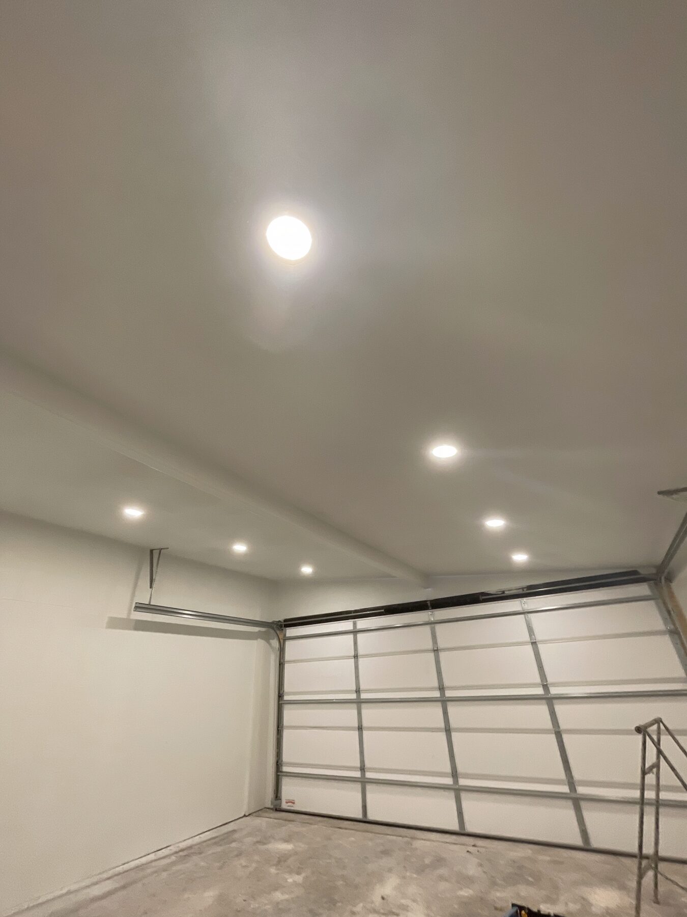 Smooth finished drywall with recessed lighting