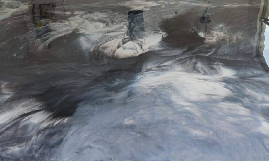Metallic epoxy garage floor coating