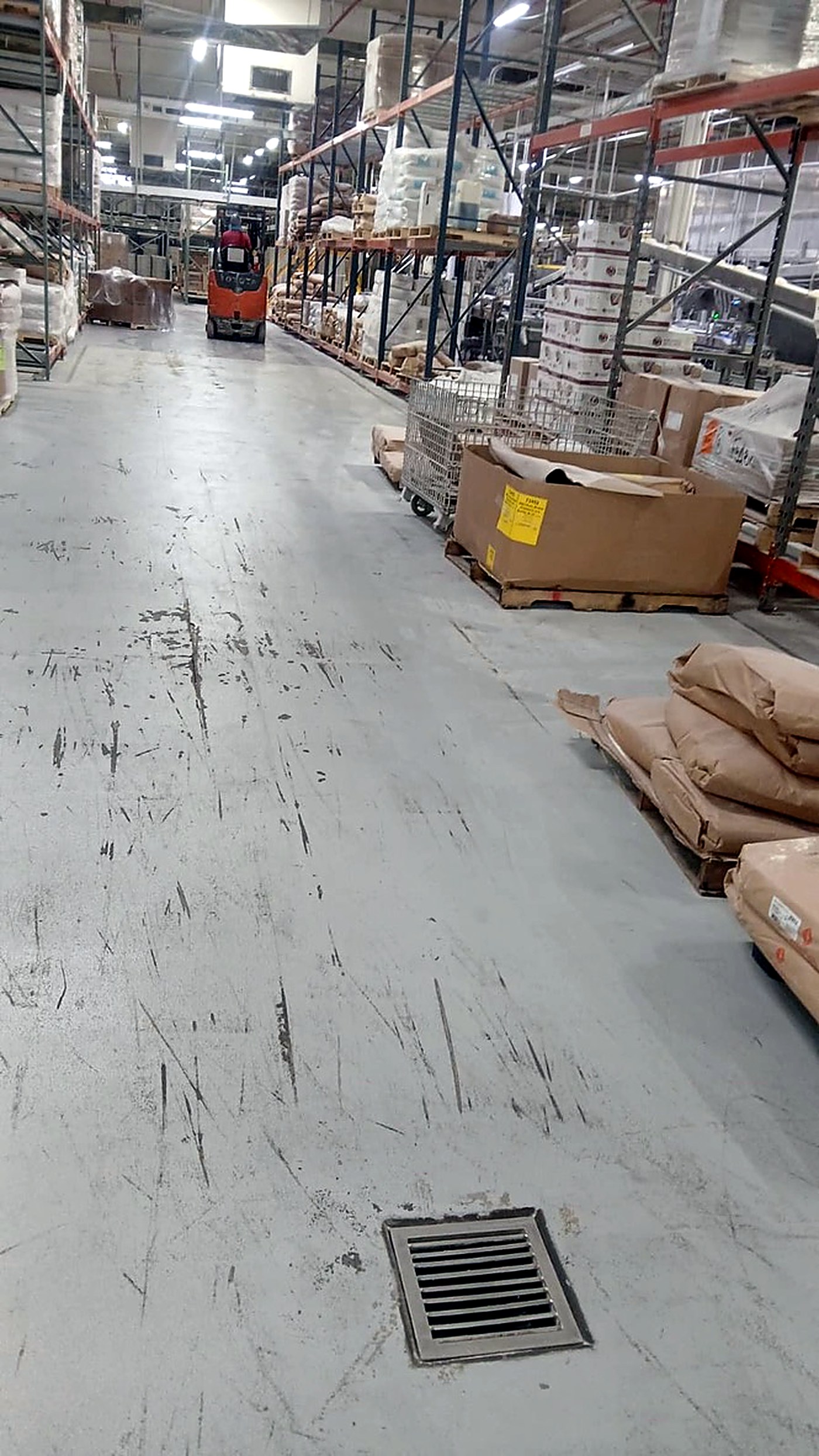 Warehouse concrete floor before epoxy coating