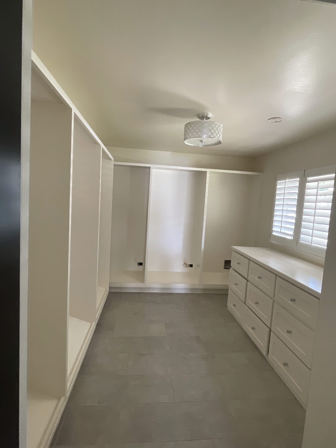 Custom walk-in closet finish-out with built-ins